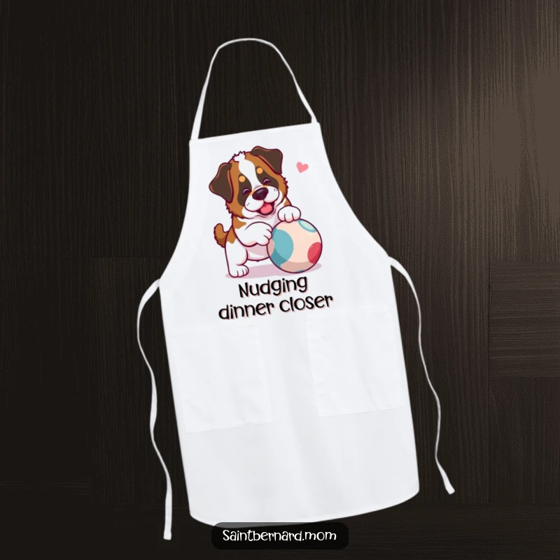 Funny Saint Bernard Lady Apron showing a dog playfully nudging a ball, adding a touch of fun to kitchen activities.