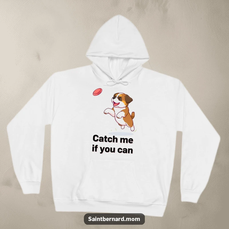Funny Saint Bernard puppy hoodie depicting a determined dog leaping to catch a frisbee, embodying playful energy and canine fun.