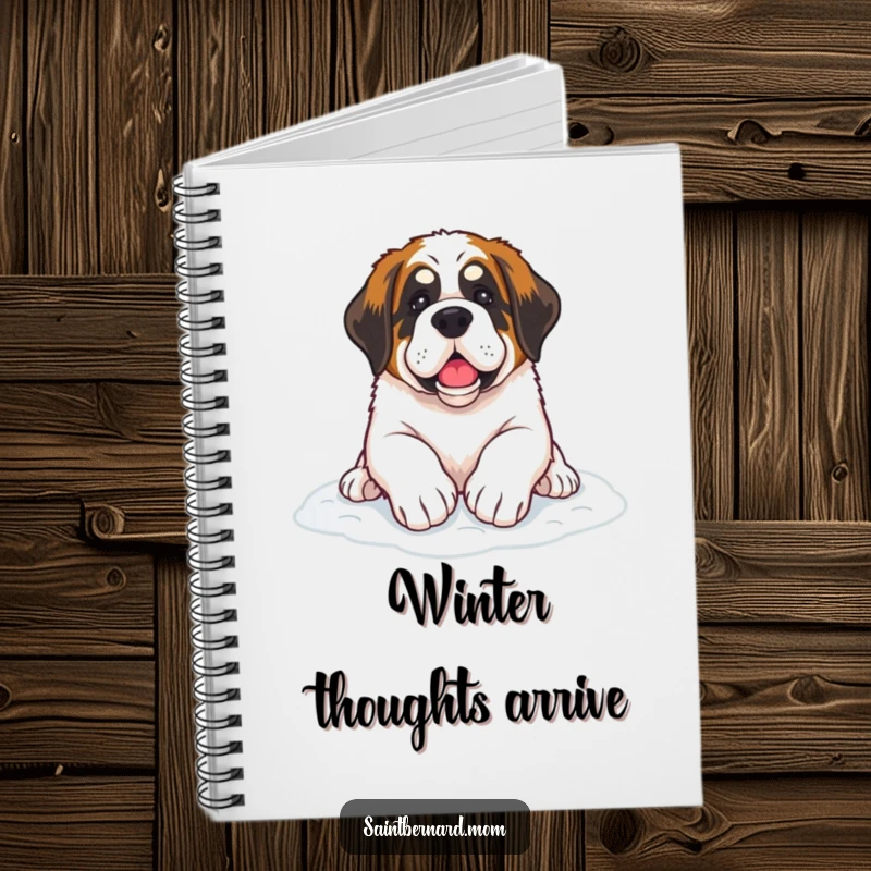 Funny Saint Bernard dog notebook with paws resting on soft snow, ideal for jotting down winter thoughts.